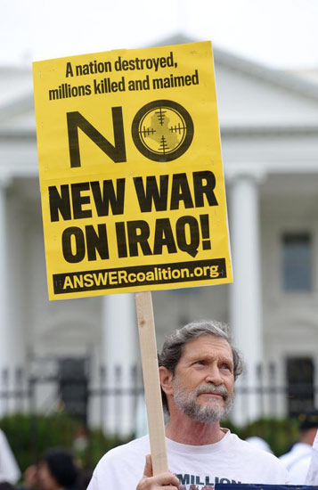 美国曾暗助伊拉克 各打算盘不动真格
