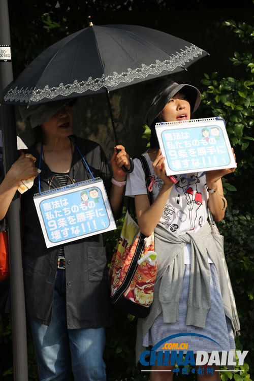 独家：日本民众抗议安倍允许行使集体自卫权（组图）