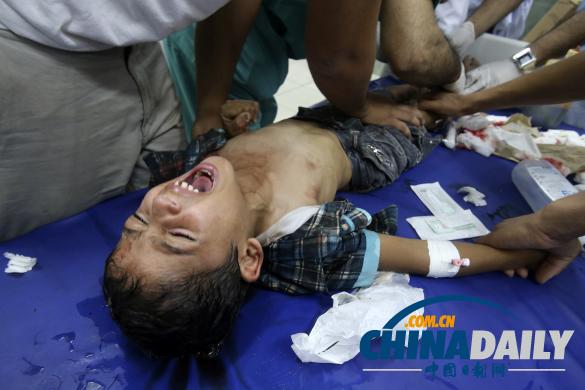 组图：以色列空袭加沙数十人丧生 母亲痛失幼女肝肠寸断
