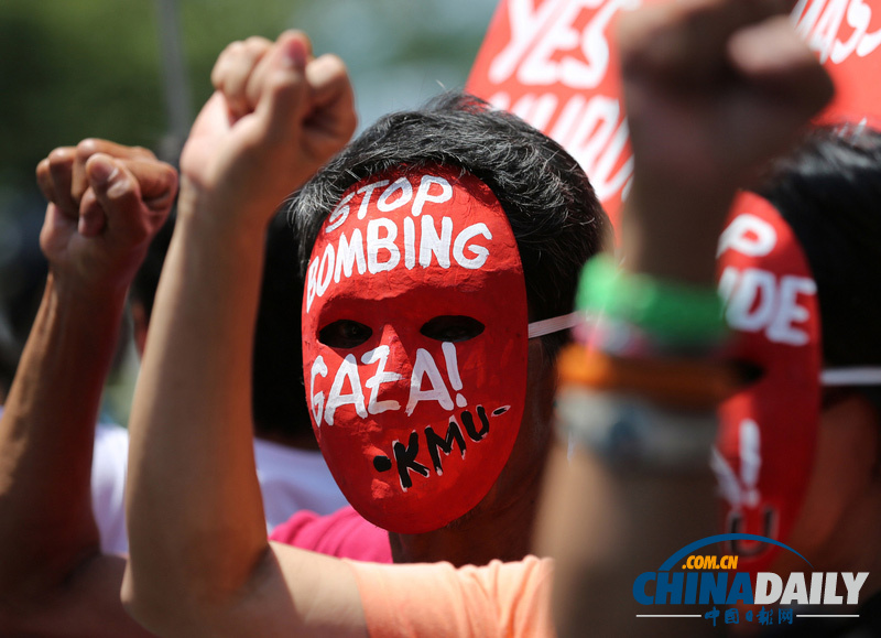 菲示威者戴红色面具抗议以色列进攻加沙