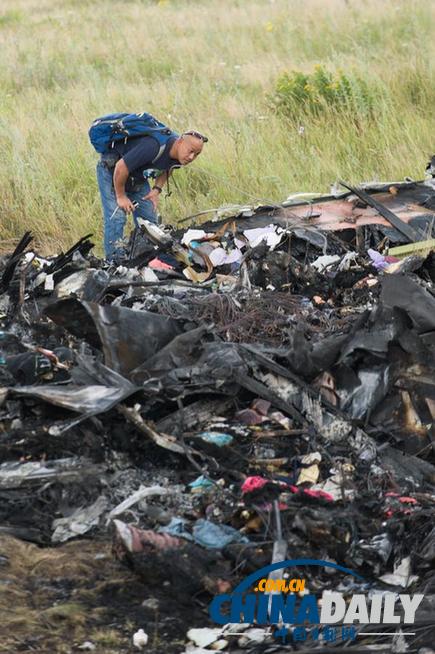 马专家将继续在乌搜寻 誓找到MH17全部遇难者遗体