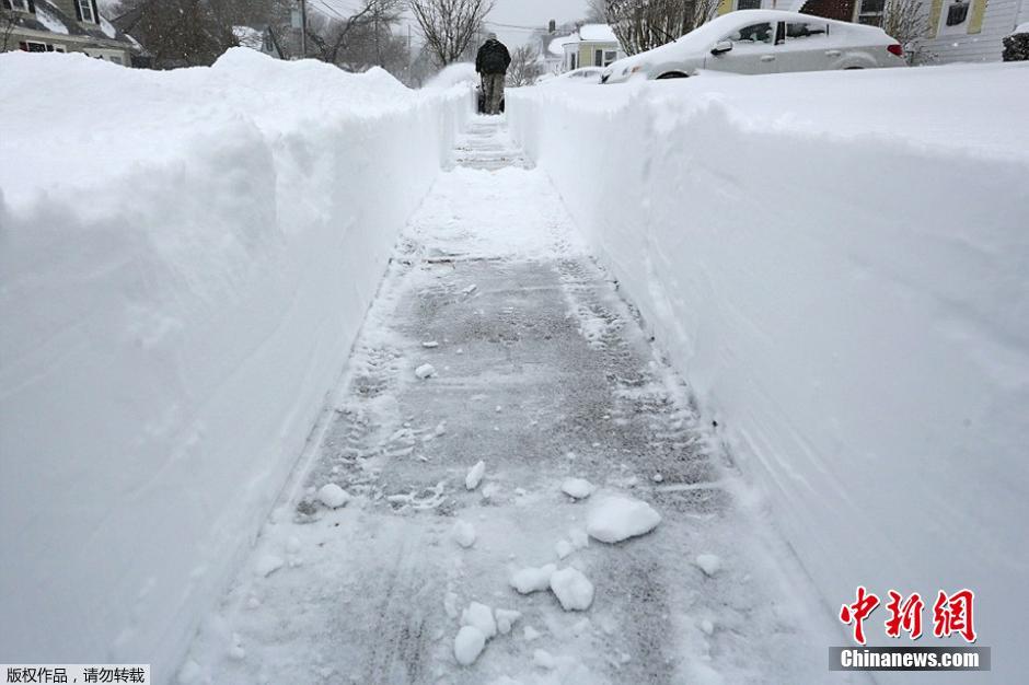 美国马萨诸塞州遭受暴雪洪水双重袭击