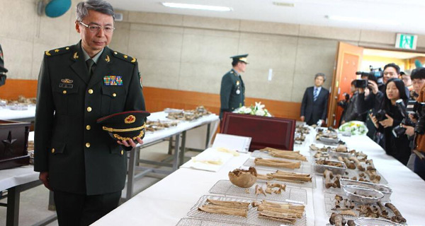 韩媒：韩中两国20日举行68具中国志愿军遗骸交接仪式