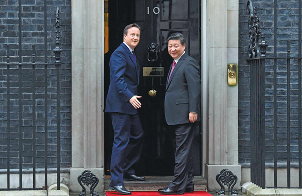 习近平同英国首相卡梅伦举行会谈决定共同构建中英面向21世纪全球全面战略伙伴关系开启中英关系“黄金时代”