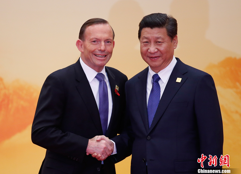 习近平迎接澳大利亚总理阿博特参加APEC会议